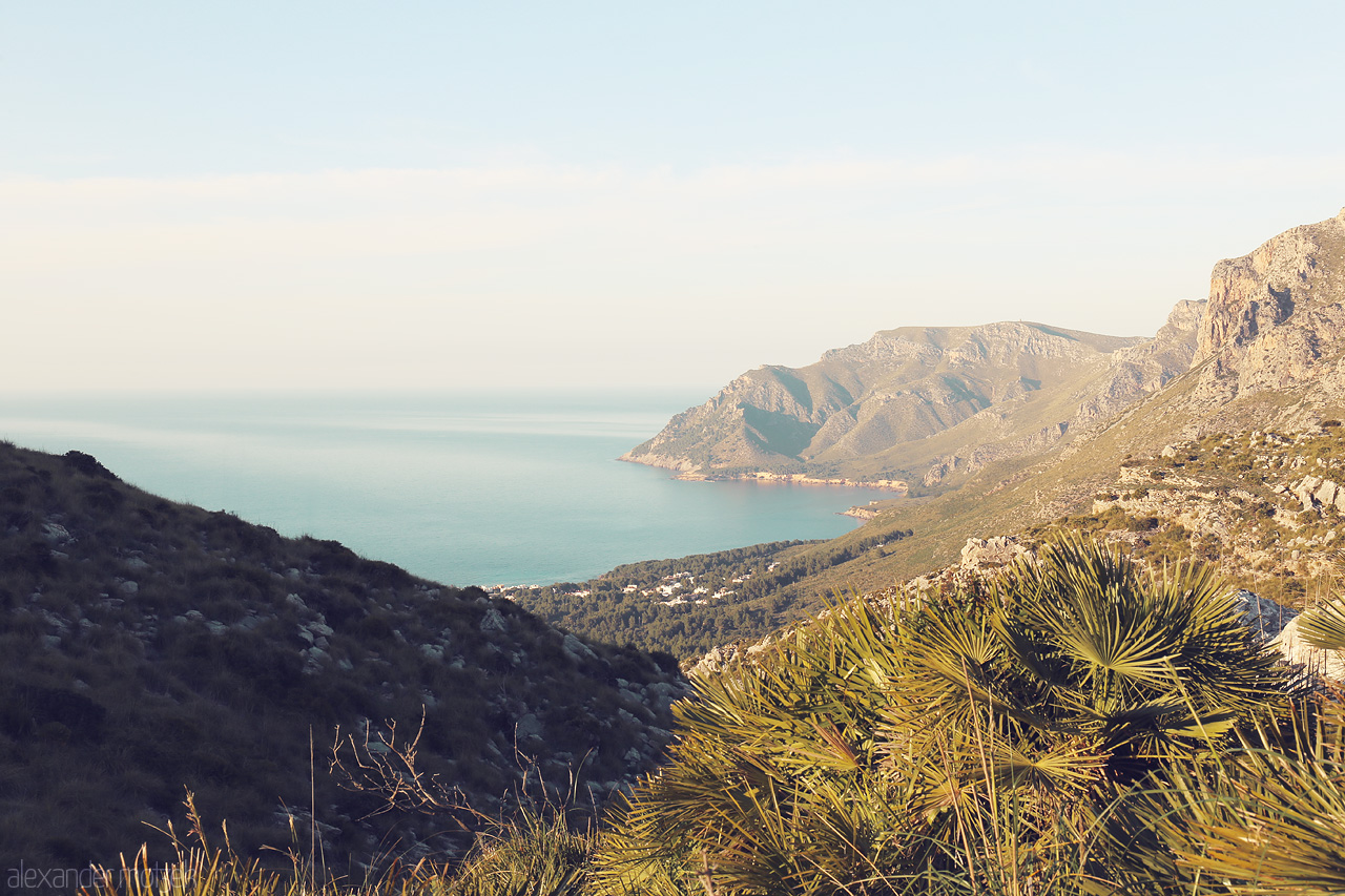 Foto von Sunlit Artà, embraced by the Serra de Llevant hills, overlooks the tranquil Mediterranean blues.