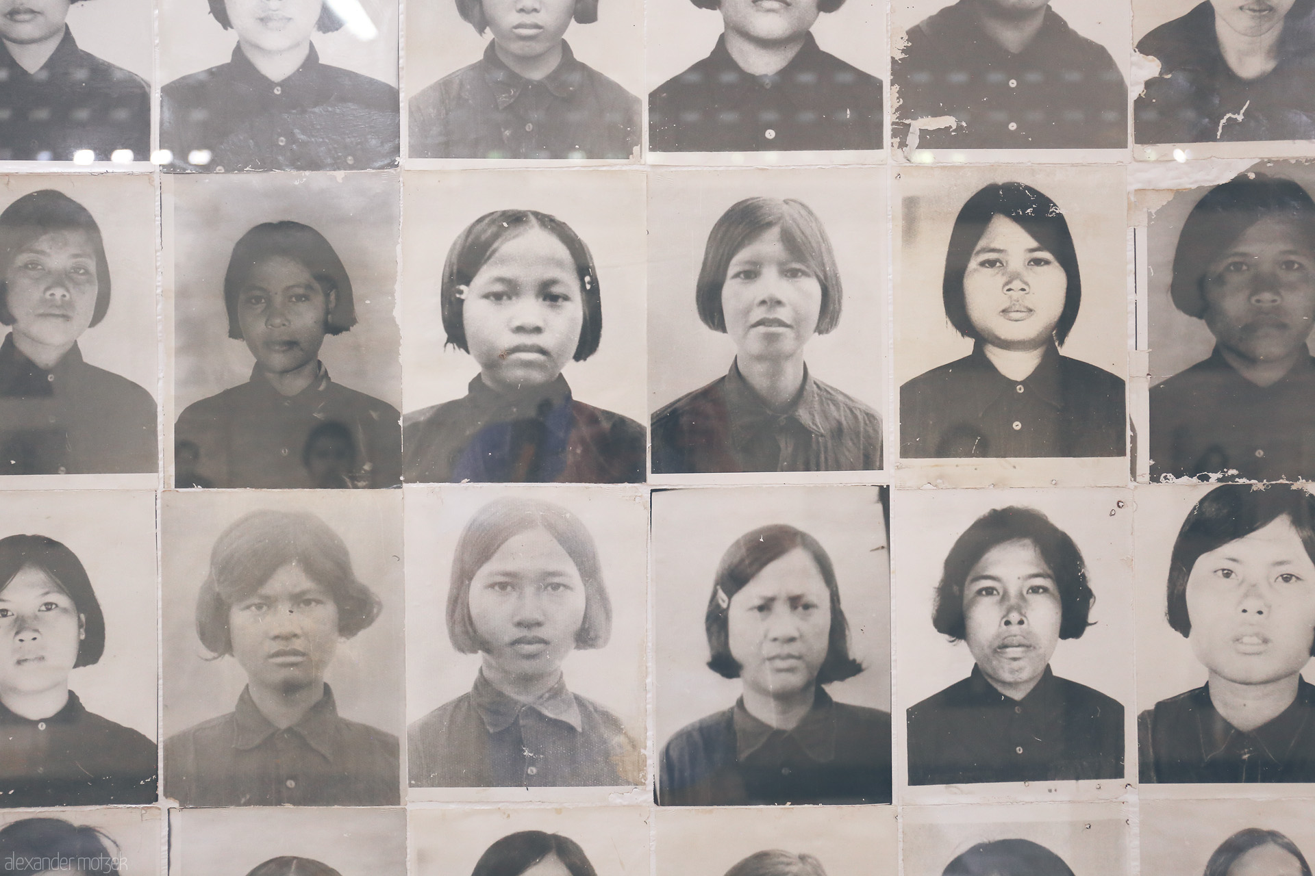 Echoes of Tuol Sleng Foto von Portraits from Tuol Sleng Genocide Museum, Phnom Penh—silent witnesses bearing Cambodia's tragic Khmer Rouge history.